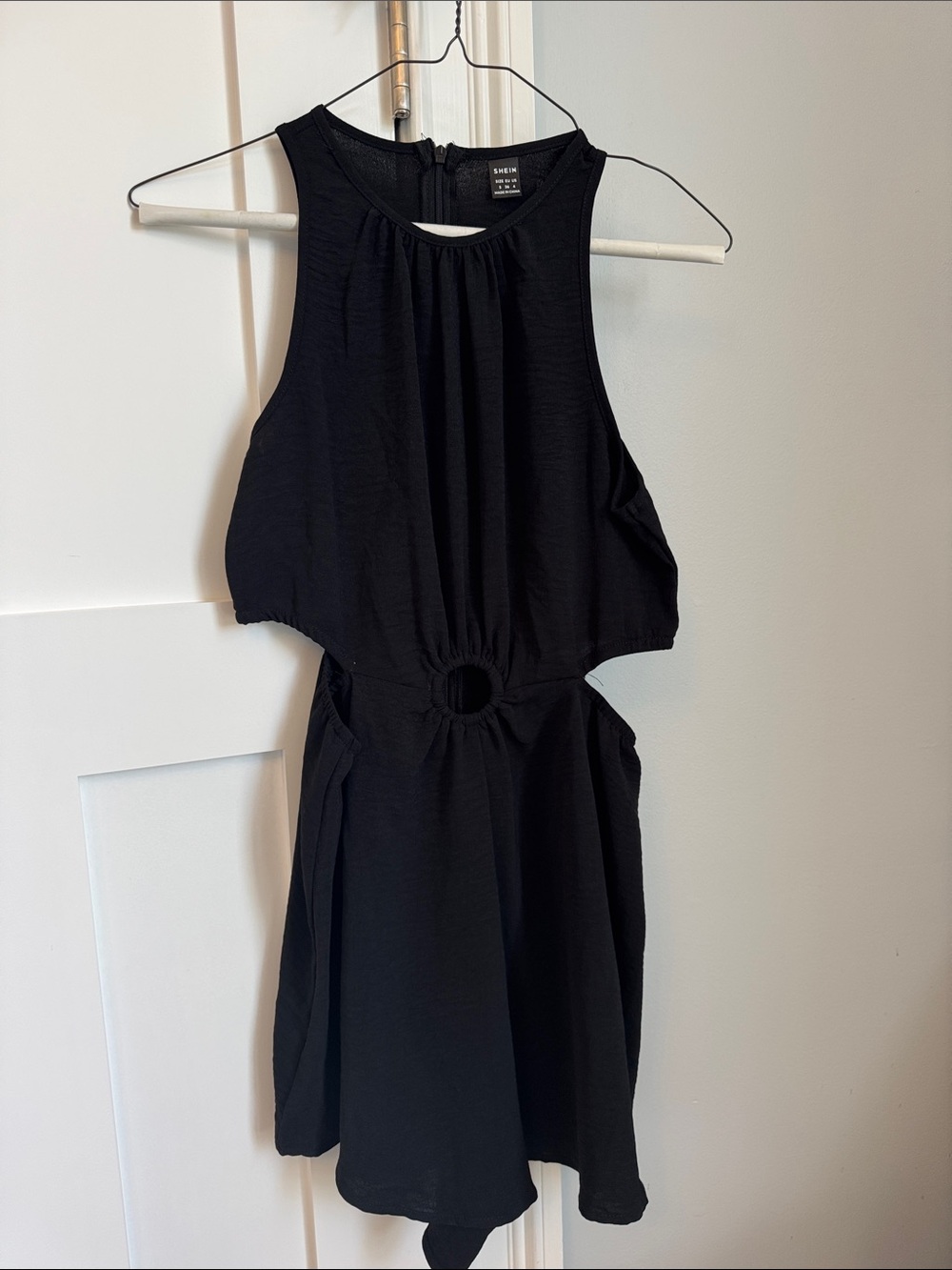 Black Cutout Mini romper with Ring Detail